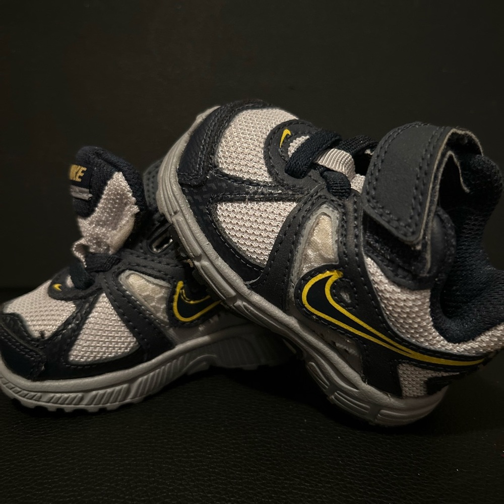 Baby sized Nike sneakers (lightly used)